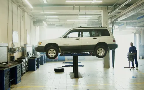 A vehicle being serviced in a clean professional workshop — illustrative stock photo, not Bookhelp vendors or customers