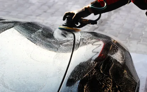 Exterior car paint being polished — illustrative photo, not Heffner Toyota Detailing